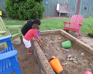 Neighbors | Alexis Bartolomucci.Children dug in the sand during the Fellows Riverside Garden's Family Fun Friday program on June 23.