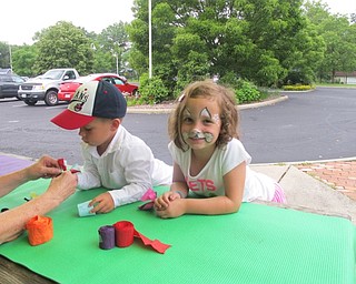 Neighbors | Alexis Bartolomucci.Giada and Cooper made craft jewelry out of crepe paper on June 23 during the Family Fun Fridays at Fellows Riverside Garden.