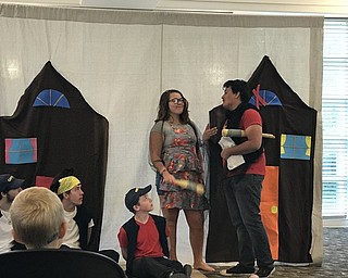 Neighbors | Alexis Bartolomucci.High school students acted out Arabian Nights fairytales for guests at the Austintown library on July 1.