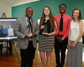 Sister Jerome’s Mission, a program of the Ursuline Sisters of Youngstown, presented four students taking part in Sister Jerome’s Mission College program with scholarships during a luncheon recently at the Ursuline Center. The scholarships honor local businessman Clarence R. Smith Jr. and his wife, Rose Marie. Scholarship recipients are Kevin Talley of Hermitage, Lauren Wimer of Warren, Sara Egry of Girard and RaKaiya Peterman of Niles. All four are majoring in social work and attend Youngstown State University. At right, from left, are Talley and Wimer, who each received a $1,000 scholarship; Ramone Elkins, who received the scholarship last October when it was first introduced; and Maraline Kubik, director, who presented the awards. Not present for picture were Egry, who received $750, and Peterman, who received $250.
