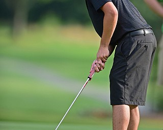 VIENNA, OHIO - JULY 21, 2017: Brandon Coffi follows through on his putt on the 16th hole, Friday evening at Squaw Creek Country Club during round one of the 17u Vindicator's Greatest Golfer of the Valley Junior Tournament. DAVID DERMER | THE VINDICATOR