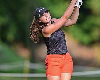 VIENNA, OHIO - JULY 21, 2017: Jenna Vivo follows through on her approach shot on the 16th hole, Friday evening at Squaw Creek Country Club during round one of the 17u Vindicator's Greatest Golfer of the Valley Junior Tournament. DAVID DERMER | THE VINDICATOR