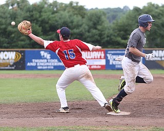 Baird pitcher Mike Turner (10) tags safe onto first base as Park Home first baseman John Garity (15) reaches out for the ball in the first inning as Baird Brothers take on Park Home in round 5 of the 18U NABF World Series, Saturday, July 22, 2017, at Bob Cene Park in Struthers. Park Home won 4-1...(Nikos Frazier | The Vindicator)..