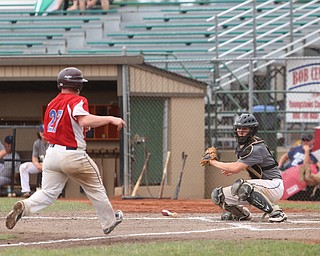Baird catcher Coleman Stauffer (8) waits to tag out Park Home second baseman Jake Wike (27) in the second inning as Baird Brothers take on Park Home in round 5 of the 18U NABF World Series, Saturday, July 22, 2017, at Bob Cene Park in Struthers. Park Home won 4-1...(Nikos Frazier | The Vindicator)..