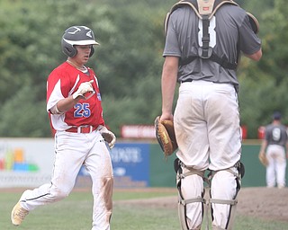 Park Home second baseman Jake Wike (27) scores a run in the third inning as Baird Brothers take on Park Home in round 5 of the 18U NABF World Series, Saturday, July 22, 2017, at Bob Cene Park in Struthers. Park Home won 4-1...(Nikos Frazier | The Vindicator)..