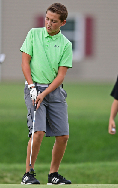 WARREN, OHIO - JULY 22, 2017: Patrick Howlett reacts after missing a putt on the 18th hole, Saturday afternoon at the Vindicator's Greatest Golfer of the Valley Jr. Championship at Avalon Lakes. DAVID DERMER | THE VINDICATOR