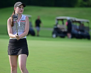 WARREN, OHIO - JULY 22, 2017: Hannah Keffler of Canfield shows her frustration after missing a putt on the 18th hole, Saturday afternoon at the Vindicator's Greatest Golfer of the Valley Jr. Championship at Avalon Lakes. DAVID DERMER | THE VINDICATOR