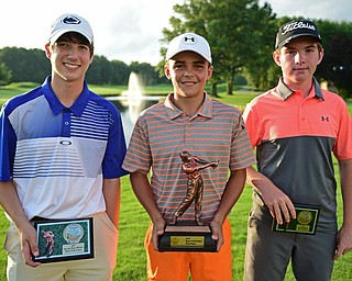 WARREN, OHIO - JULY 22, 2017: Cameron Colbert, left, Jacob Sylak, center, Kaiden Sykes, right, pose for a picture with their awards, Saturday afternoon at the Vindicator's Greatest Golfer of the Valley Jr. Championship at Avalon Lakes. DAVID DERMER | THE VINDICATOR