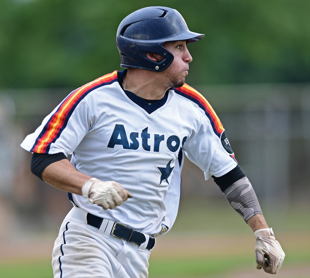 STRUTHERS, OHIO - JULY 23, 2017: Astro's Matt Gibson runs to first base after a single in the fourth inning of their game Sunday morning against the Ohio Longhorns. Astro won 12-2. DAVID DERMER | THE VINDICATOR