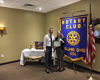 Dan Madden, president of Poland Rotary club and a funeral director with Becker Funeral Home, welcomes the club’s newest member, Megan Brocker, an associate accountant with Hill, Barth & King CPAs, at a recent meeting.