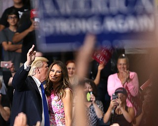 President Donald J. Trump and First Lady Malania Trump greet supporters as they depart after speaking at the Covelli Centre, Tuesday, July 25, 2017 in Youngstown...(Nikos Frazier | The Vindicator)