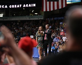 Eric Trump and wife Lara Trump wave as they exit after speaking before President Donald J. Trump at the Covelli Centre, Tuesday, July 25, 2017 in Youngstown...(Nikos Frazier | The Vindicator)