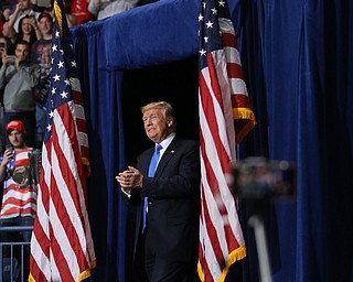 President Donald J. Trump enters the Covelli Centre with wife Melania Trump, Tuesday, July 25, 2017 in Youngstown...(Nikos Frazier | The Vindicator)