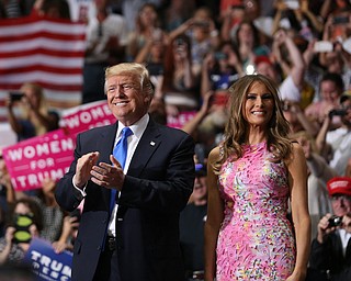 President Donald J. Trump enters the Covelli Centre with wife Melania Trump, Tuesday, July 25, 2017 in Youngstown...(Nikos Frazier | The Vindicator)
