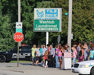 President Donald Trump's motorcade was greeted by supporters as it drove down Midlotian Blvd. in Struthers on Tuesday evening.   Dustin Livesay  |  The Vindicator  7/25/17  Struthers.