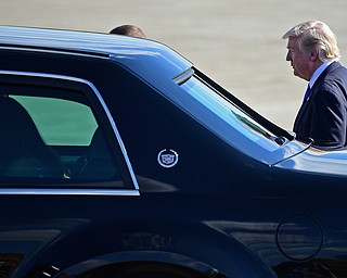 President Donald Trump enters a car at the Youngstown-Warren Regional Airport, Tuesday, Tuesday, July 25, 2017, in Vienna, Ohio. Trump will be speaking at a rally Tuesday at the Covelli Centre in Youngstown, Ohio. (David Dermer/The Vindicator via AP)