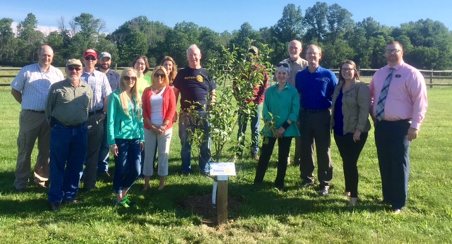 Mercer Rotary Club recently had a tree-dedication ceremony. The club partnered with the Mercer County Conservation District and Munnell Run Farm and planted two apple trees behind the Bigler House on Munnell Run. More trees are to be planted this year with a goal of 31 trees to be planted by the Rotary by July 1, 2018. Pictured above are members of the Munnell Run Farm team, Mercer County Conservation District members and Mercer Rotarians.