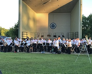 Neighbors | Alexis Bartolomucci.The Canfield Community Concert Band stood and bowed after a performance at Austintown Park on June 27.