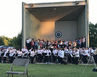 Neighbors | Alexis Bartolomucci.The Canfield Community Concert Band welcomed piccolo players to try and break the record of most piccolos present playing "Stars and Stripes."