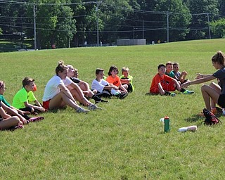 Neighbors | Abby Slanker.Members of the Canfield High School soccer teams taught Canfield Soccer Club Recreational League players foot skills, practiced drills and played games during the annual Players Clinic on June 16.