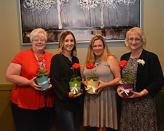 The Poland Junior Women’s Club installed new officers for 2017-18 at its end-of-year social event recently at the Magic Tree Pub. Above, new officers, from left, are Terri Windsor. secretary; Carolyn Fender, treasurer; Jacci Miller, vice president, and Dianne Phillips, president. The PJWC also awarded scholarships to two Poland Seminary High School seniors, Megan Johnson and Jacob Hockensmith, during its first summer concert last month. Below, from left are, Phillips, Johnson and Hockensmith. For more information about the Poland Junior Women’s Club, visit www.pjwc.org.
