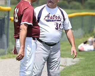 /br16/ and Youngstown Astros Gill Geisel (31) talk before an over 50 baseball game between the Boardman Fog and Youngstown Astros at Boardman High School baseball field, Sunday, July 16, 2017 in Boardman...(Nikos Frazier | The Vindicator)