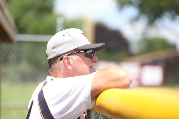 Youngstown Astros  Don Christian (24) watches the game from the dugout during an over 50 baseball game between the Boardman Fog and Youngstown Astros at Boardman High School baseball field, Sunday, July 16, 2017 in Boardman...(Nikos Frazier | The Vindicator)