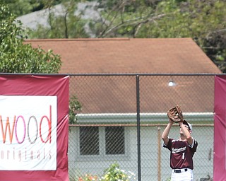 Boardman Fog  Butch Angelucci (1) with the out during an over 50 baseball game between the Boardman Fog and Youngstown Astros at Boardman High School baseball field, Sunday, July 16, 2017 in Boardman...(Nikos Frazier | The Vindicator)