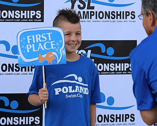 Chase Jones (9) of Poland takes a picture after coming in first place in the 25 meter backstroke during the Youngstown Swim League championships at the Poland Swim club in Poland on Saturday morning.  Dustin Livesay  |  The Vindicator  7/29/17  Poland.