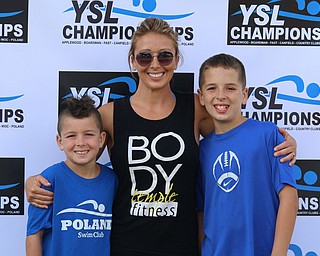 Lindsey Jones (center) takes a picture with her sons Chase (left,9) and Mason (right,12) all of Poland during the Youngstown Swim League championships at the Poland Swim club in Poland on Saturday morning.  Dustin Livesay  |  The Vindicator  7/29/17  Poland.