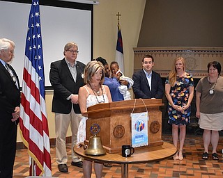 Rotary Club of Youngstown recently installed Frank Kishel as its new president for 2017-18. He was sworn in by Deborah Esbenshade, past district governor of Rotary District 6650 and past president of the Rotary Club of Youngstown. Officers for 2017-18 are: Kishel, president; John Fahnert, president-elect; David Stillwagon, vice president; Joshua Prest, treasurer; and Samantha Turner, secretary. Three new board members announced were Ellie Platt, Maureen Drummond and Elayne Bozick. Rotary Club of Youngstown is a part of Rotary International, a service organization whose purpose is to bring together business and professional leader in order to provide humanitarian services, encourage ethical standard in all vocations and help build goodwill and peace in the world. Pictured above, in front is Esbenshade. Back row, from left are Kishel; H. William Lawson, immediate past president; Turner (holding her son, honorary Rotarian, Anthony); Prest; Platt; and Drummond.