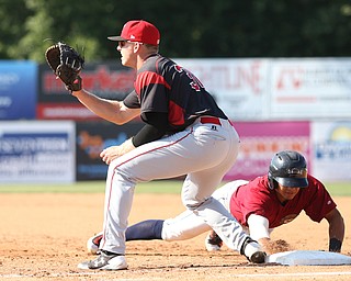 Mahoning Valley Scrappers first baseman Ulysses Cantu (8) slides back into first before Batavia Muckdogs first baseman Ben Fisher (36) catches the ball in the third inning as the Scrappers take on the Batavia Muckdogs, Sunday, July 30, 2017, at Eastwood Field in Niles. TEAM won 00-00...(Nikos Frazier | The Vindicator)..