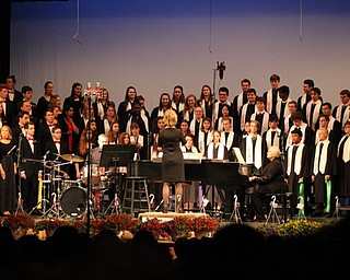 Neighbors | Abby Slanker.On May 25, all Canfield High School choirs took the stage together, under the direction of Kelly Scurich, to perform “Jai Ho” during the school’s annual spring concert.