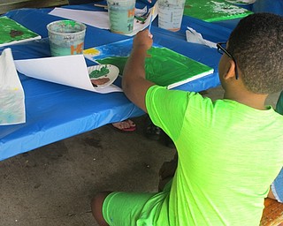 Neighbors | Alexis Bartolomucci.One of the children at Camp FRIEND painted a background on his canvas.