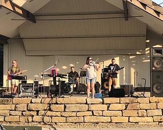 Neighbors | Alexis Bartolomucci.Christy Kopsac played the fiddle during one of the performances by the Wrangler Band on June 29 at Boardman Park.