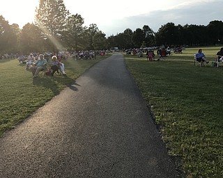 Neighbors | Alexis Bartolomucci.Guests set up chairs and blankets at the Maag Outdoor Theater on June 29 to watch the Wrangler Band play.