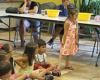 Neighbors | Alexis Bartolomucci.Children at the Red Hen and Wheat Sprout Club program on July 20 demonstrated how to waddle like a duck.