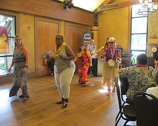 Neighbors | Alexis Bartolomucci.Guests at the senior day luau at Boardman Park on July 27 went on the dance floor and did the "Electric Slide."