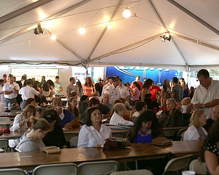 The tent crowd during the Greater Youngstown Italian Festival, Friday, August 4, 2017 in Downtown Youngstown...(Nikos Frazier | The Vindicator)