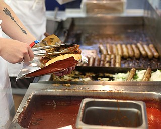 A DiRusso's Italian Sausage during the Greater Youngstown Italian Festival, Friday, August 4, 2017 in Downtown Youngstown...(Nikos Frazier | The Vindicator)
