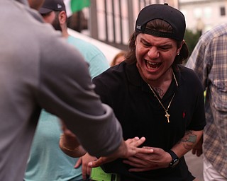 Luigi Lombardi of Hermitage, Pa. plays Mora during the Greater Youngstown Italian Festival, Friday, August 4, 2017 in Downtown Youngstown...(Nikos Frazier | The Vindicator)
