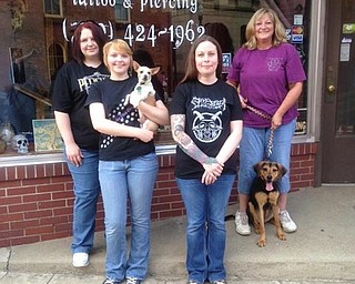 Stigmata Tattoo & Piercing, 119 W. Lincoln Highway, Lisbon, will host its fourth annual “Get Inked for Animals” fundraiser for Legacy Dog Rescue. This five-day event will run from 12:30 to 8 p.m. Tuesday through Saturday. During the event, 50 percent of all metal, ink and gift cards purchased will be donated to Legacy. Walk-in appointments are welcome, or call Stigmata at 330-424-1962 to schedule an appointment. For more information on LDR, visit www.ldrofohio.org. Above, from left, are Kerry Humphrey; Hollie Peterson with Legacy alumni Potter; Valerie Duffy; and Christy Baker with current adoptable, Bonnie.