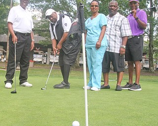Omega Psi Phi Fraternity Inc. will host its fourth annual scholarship golf scramble in memory of Jamail E. Johnson. Johnson was a Youngstown State University student who was killed Feb. 6, 2011, while saving the lives of 12 friends. The scramble will take place Aug. 12 at Mill Creek Golf Course. Pictured above, from left are Dan Smith, committee member; Tom Franklin, committee member; Shirlene and Sidney Hill, Johnson’s mother and stepfather; and Gerrald Fordham, chairman of the event.