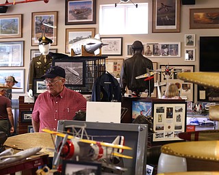 Paul Orend of Liberty looks over an exhibit during the 5th Annual Wings and Wheels, Sunday, August 6, 2017 at Ernie Hall Aviation Museum in Warren...(Nikos Frazier | The Vindicator)