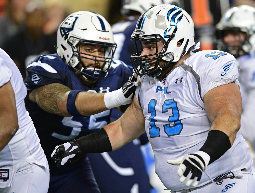 Philadelphia Soul defensive linemen Zach Zidian rushes the passer while being locked by Baltimore Brigade offensive linemen Kody Afusia on July 29, 2017 at Royal Farms Arena in Baltimore, Maryland. DAVID DERMER | THE VINDICATOR