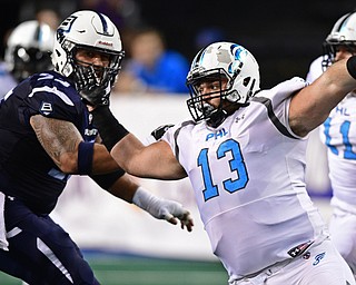 Philadelphia Soul defensive linemen Zach Zidian rushes the passer while being locked by Baltimore Brigade offensive linemen Kody Afusia on July 29, 2017 at Royal Farms Arena in Baltimore, Maryland. DAVID DERMER | THE VINDICATOR