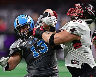 Philadelphia Soul defensive linemen Zach Zidian rushes the passer while being blocked by Cleveland Gladiators offensive linemen Adam Bice during their game on June 10, 2017 at the Wells Fargo Center in Philadelphia, Pennsylvania. DAVID DERMER | THE VINDICATOR