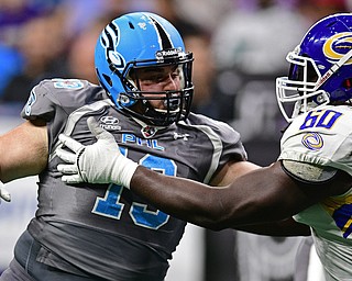 Philadelphia Soul defensive linemen Zach Zidian rushes the passer while being blocked by Tampa Bay Storm offensive linemen Jeremiah Warren during their game on June 17, 2017 at the Wells Fargo Center in Philadelphia, Pennsylvania. DAVID DERMER | THE VINDICATOR