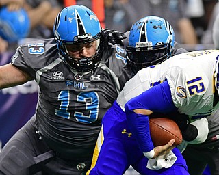 Philadelphia Soul defensive linemen Zach Zidian and linebacker Beau Bell sack Tampa Bay Storm quarterback Randy Hippeard during their game on June 17, 2017 at the Wells Fargo Center in Philadelphia, Pennsylvania. DAVID DERMER | THE VINDICATOR