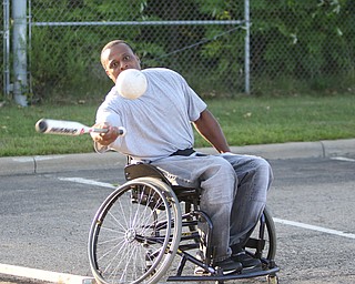 ROBERT K. YOSAY | THE VINDICATOR. The Adaptive Sports Program of Ohio - wheelchair softball - at the Covelli Centre parking lot